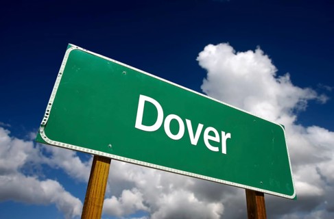 Dover road sign with dramatic blue sky and clouds