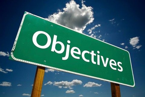 Objectives road sign with dramatic clouds and sky