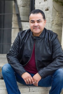 Headshot portrait of handsom hispanic man