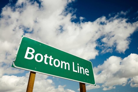 Bottom line road sign with dramatic clouds and sky