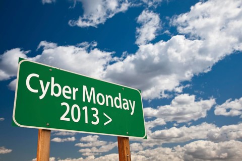 Cyber monday 2013 green road sign with dramatic clouds and sky