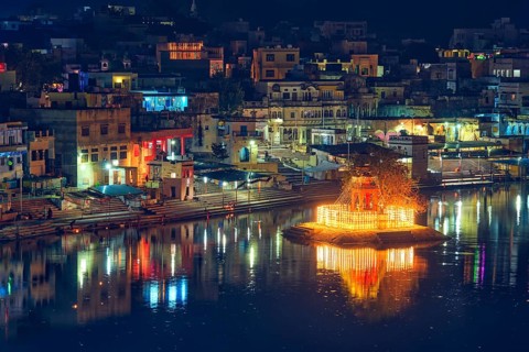 View of famous indian hinduism pilgrimage town sacred holy hindu religious city Pushkar with Brahma temple