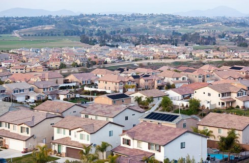 Contemporary neighborhood houses roof tops and horizon view