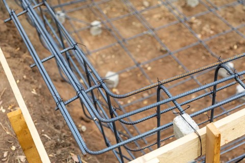 New steel rebar framing abstract at construction site