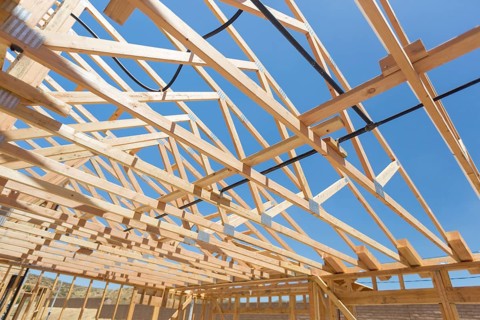 Wood home framing abstract at construction site