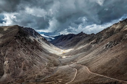 High altitude mountain road in Himalayas near Kardung La pass in Ladakh