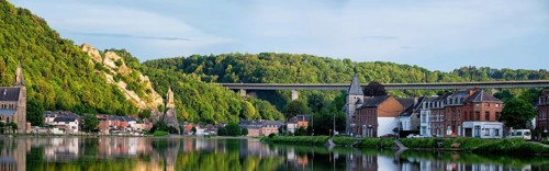 View of picturesque Dinant city over the Meuse river Dinant is a Walloon city and municipality located on the River Meuse