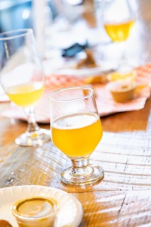 Abstract of small glass of micro brew beers on bar