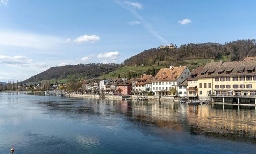 Picturesque view of the half-timbered houses and Hohenklingen Castle at the top of the hill