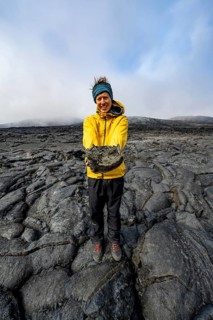 Tourist standing on petrified lava