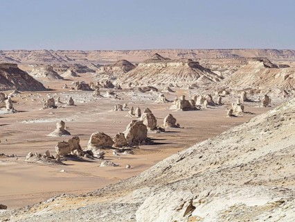 Wide valley with chalk sculptures in the Westside