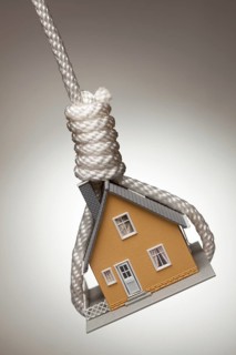 House tied up and hanging in hangman's noose