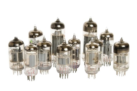 Old vacuum tubes on white background