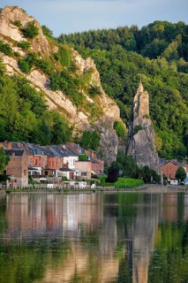 View of picturesque Dinant city over the Meuse river Dinant is a Walloon city and municipality located on the River Meuse