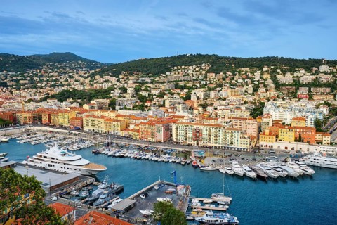 View of Old Port of Nice with luxury yacht boats from Castle Hill