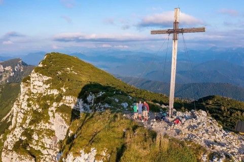 Three hikers at the summit