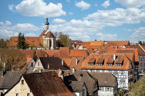 Historic old town of Bad Wimpfen with half-timbered houses and view of the town church