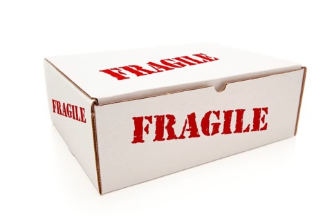 White box with the word fragile on the sides isolated on a white background