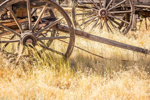 Abstract of vintage antique wood wagons and wheels