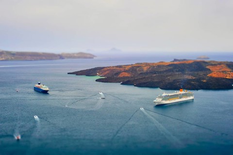 Cruise ships and tourist boats in sea Greek isaldn Santorini