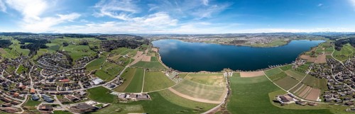 Large 360 degree panorama of Lake Greifen with the towns of Maur and Uster