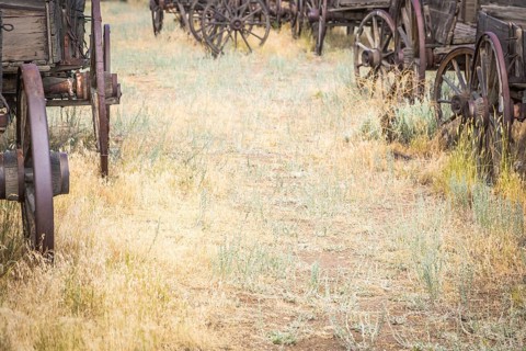 Abstract of vintage antique wood wagons and wheels