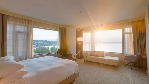 Modern bedroom interior with lakeview window