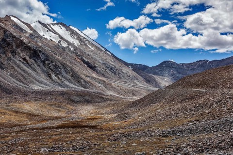 High altitude mountain road in Himalayas near Kardung La pass in Ladakh
