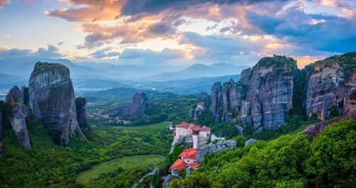 Sunset sky and monastery of Rousanou and Monastery of St