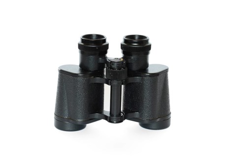 Black binoculars isolated on white background