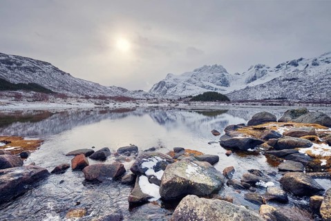 Sunset in Norwegian fjord in winter. Lofoten islands