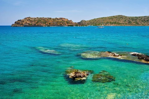 Island of Spinalonga with old fortress former leper colony and the bay of Elounda