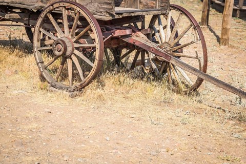 Abstract of vintage antique wood wagons and wheels