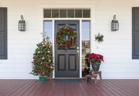 Christmas decorations at front door of house