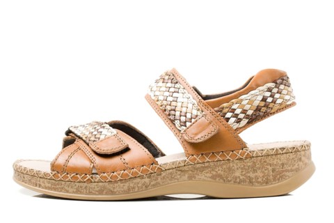 Single beige sandal isolated on white