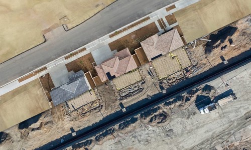 Drone aerial view cross section of home construction site