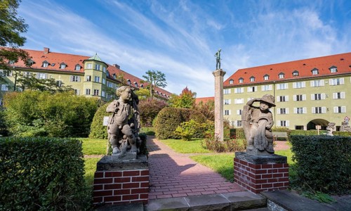 Inner courtyard with park and green residential buildings