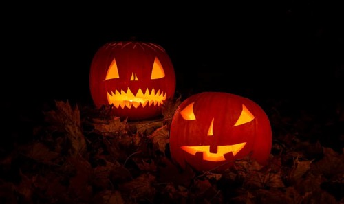 Glowing pumpkins at night