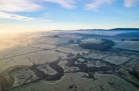 RSPB Exminster and Powderham Marshes and River Exe from a drone at sunrise
