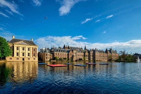 View of the Binnenhof House of Parliament and Mauritshuis museum and the Hofvijver lake