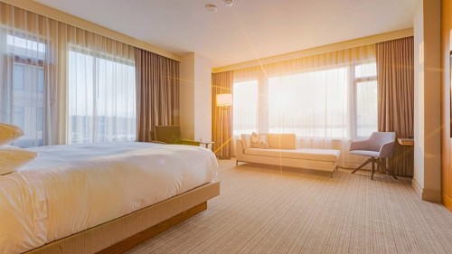 Modern bedroom interior with lakeview window