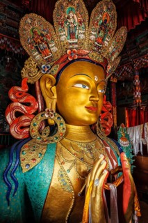 Maitreya Buddha statue close up in Thiksey Gompa. Ladakh