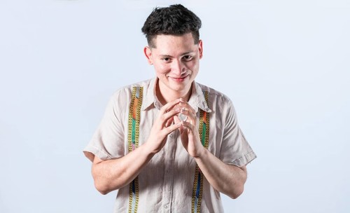 Cunning man rubbing his hands on isolated background