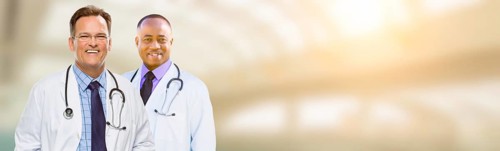 Caucasian and african american male doctor