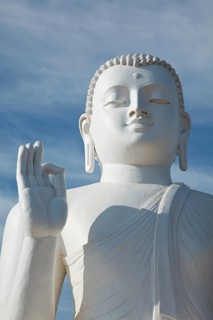 White sitting Budha image close up Mihintale