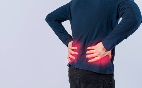 Person with back problems on isolated background