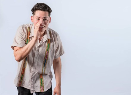 Man speaking discreetly to the camera