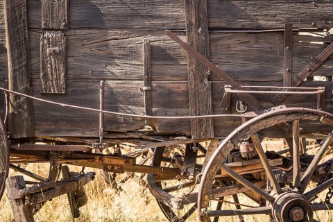 Abstract of vintage antique wood wagons and wheels
