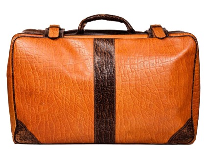 Old leather suitcase isolated on white