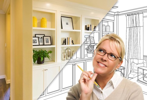 Young woman over custom built-in shelves and cabinets design drawing to cross section of finished photo
